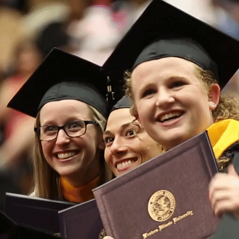 graduating students smiling