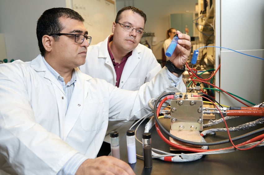 Two researchers in an engineering lab-min