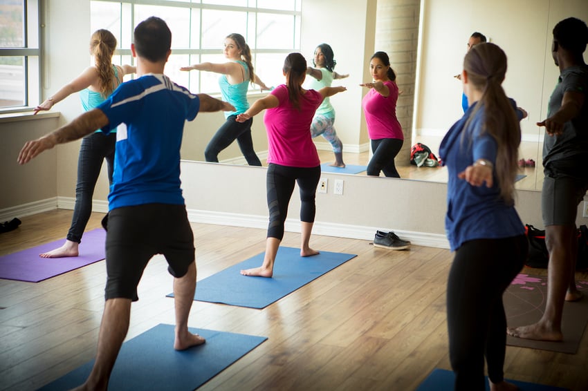 students doing yoga