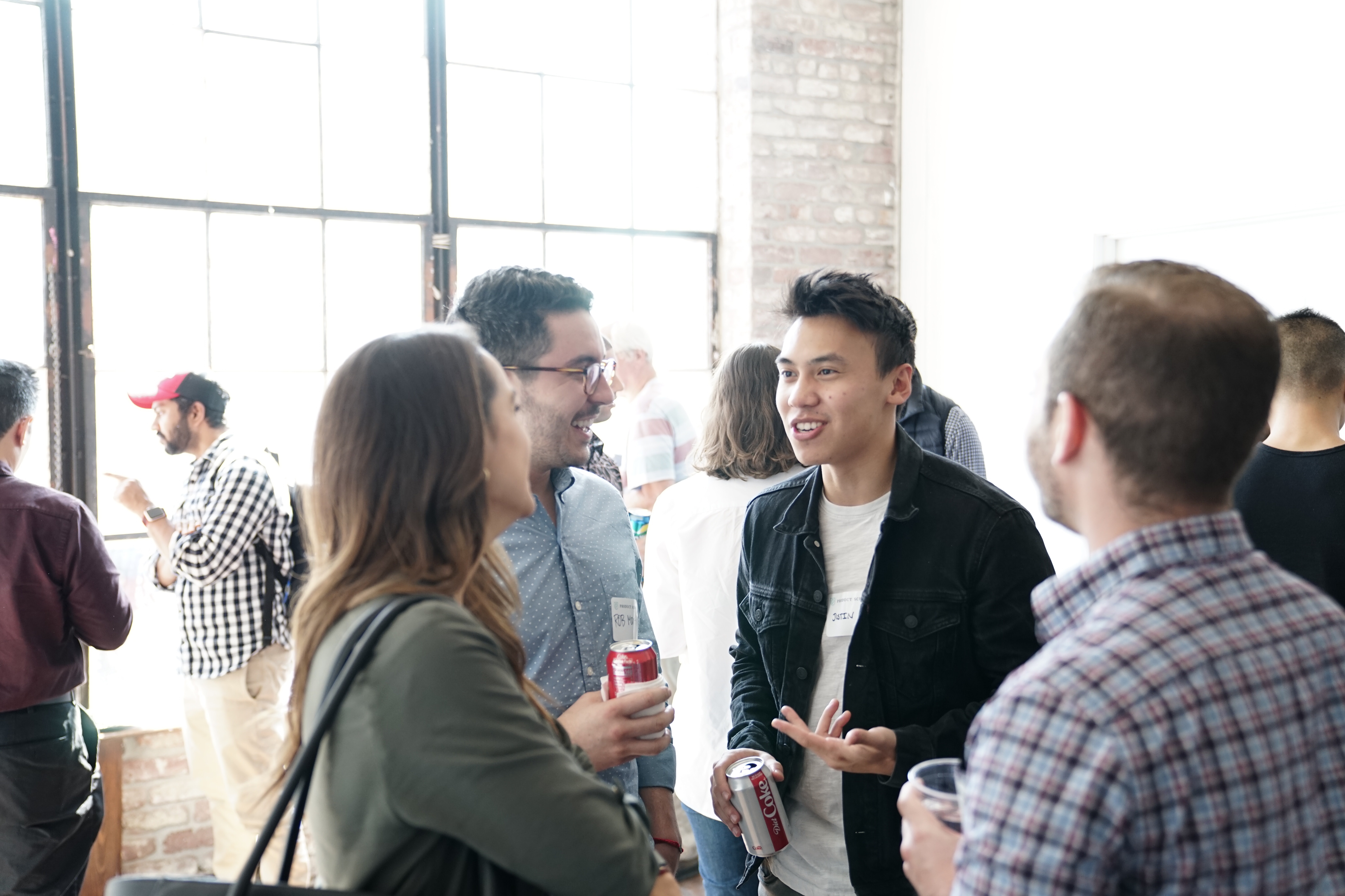 group of people gather and talk