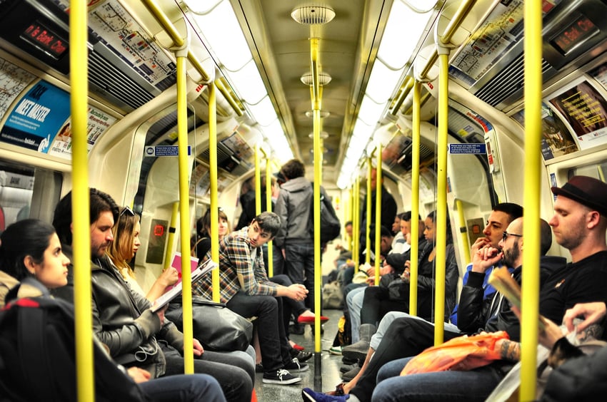 commuters ride the subway