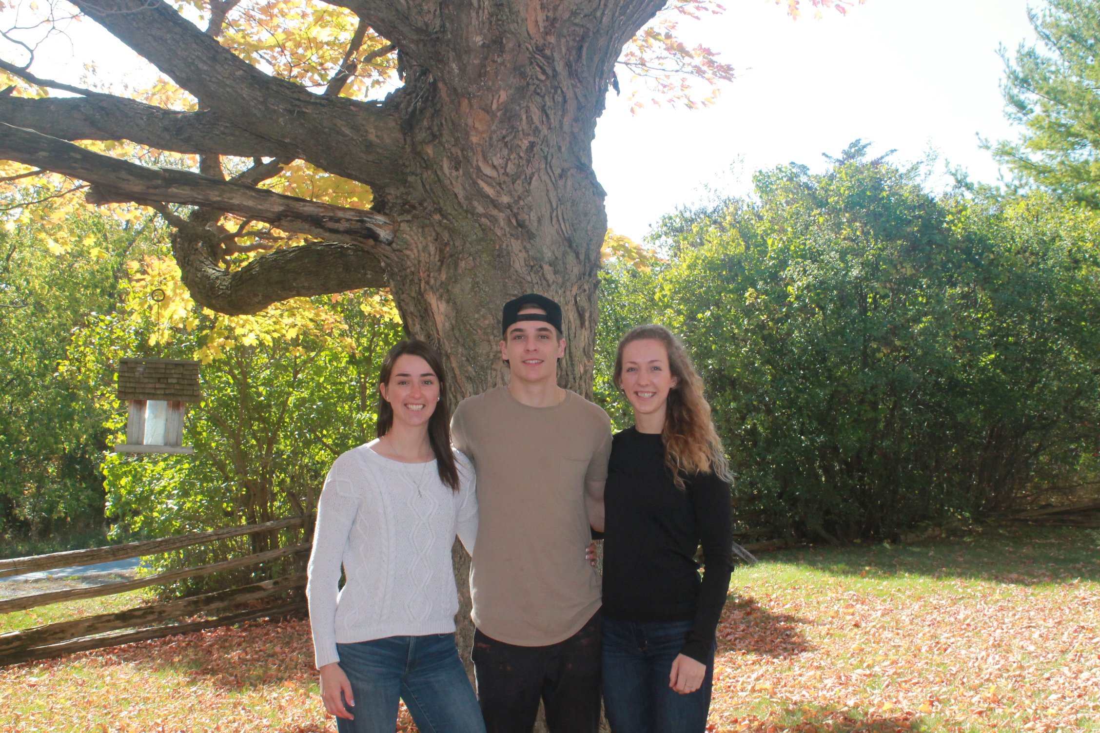 Emily and her siblings, who are her greatest friends and supports in life.