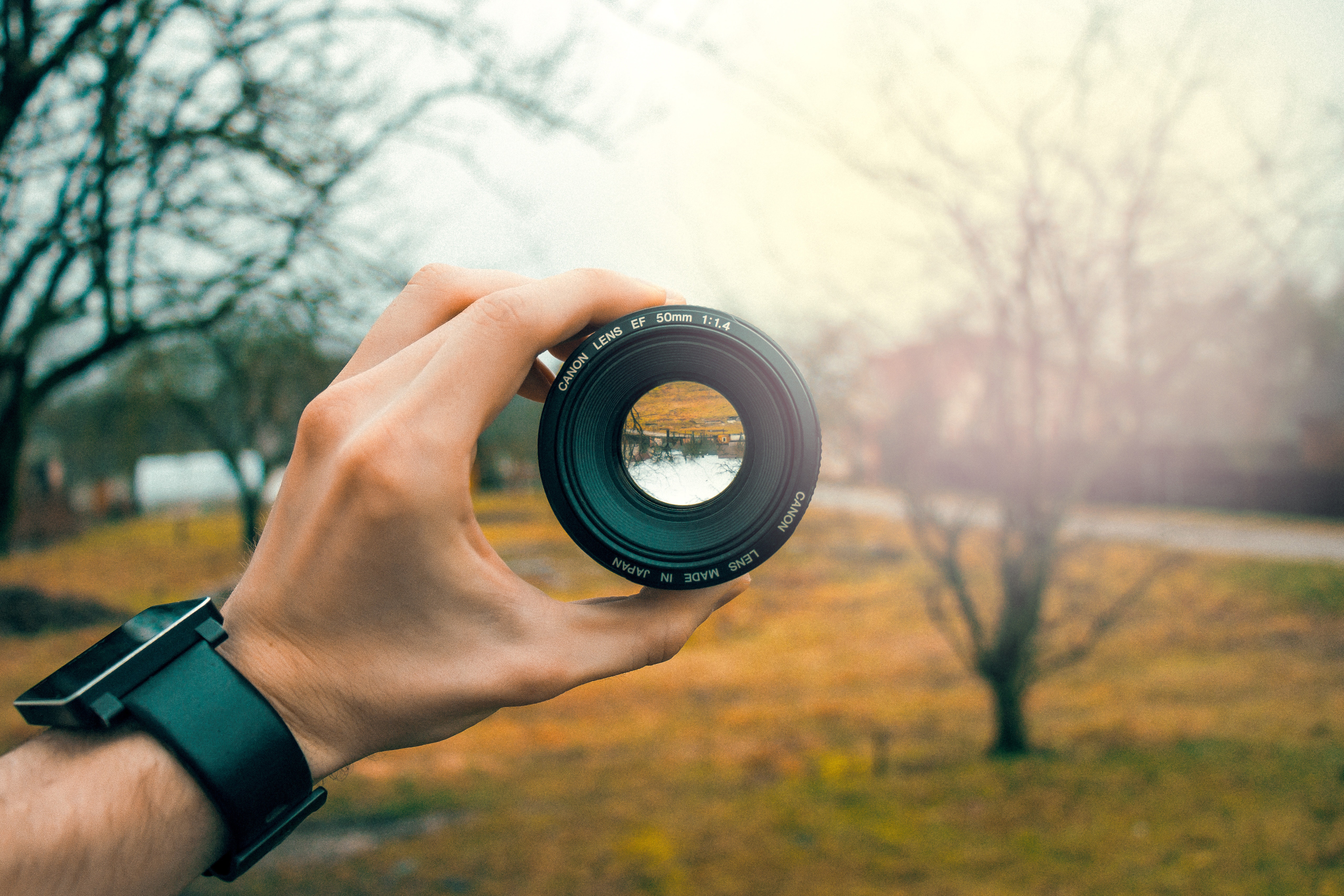 a camera lens focuses on something in the distance