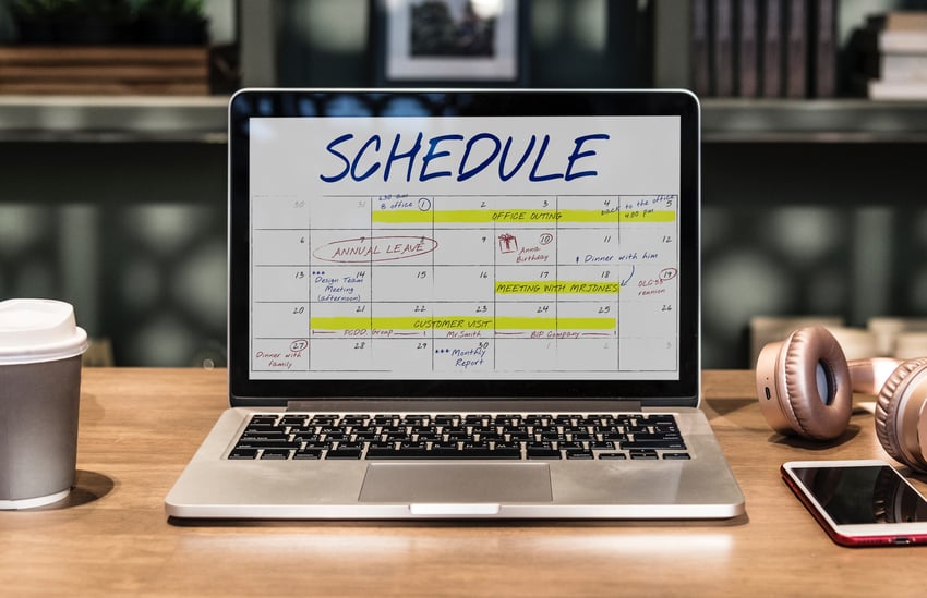 Laptop with Schedule on screen