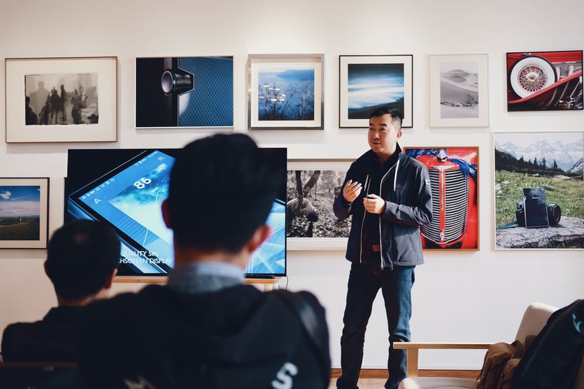 Man presenting in front of classroom