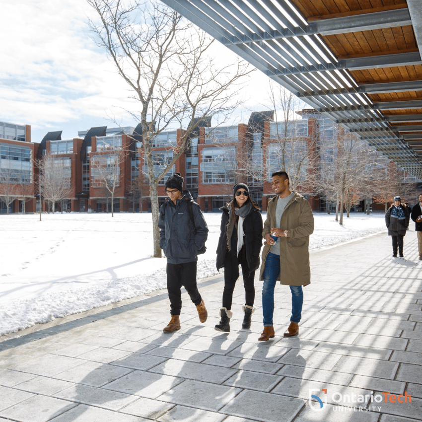 Students walking on campus grounds