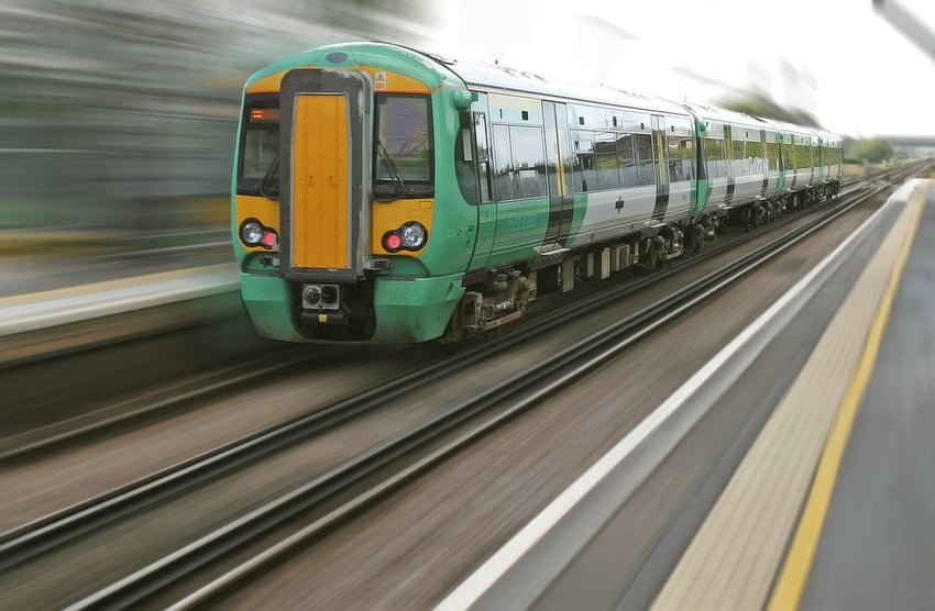 train driving down a track