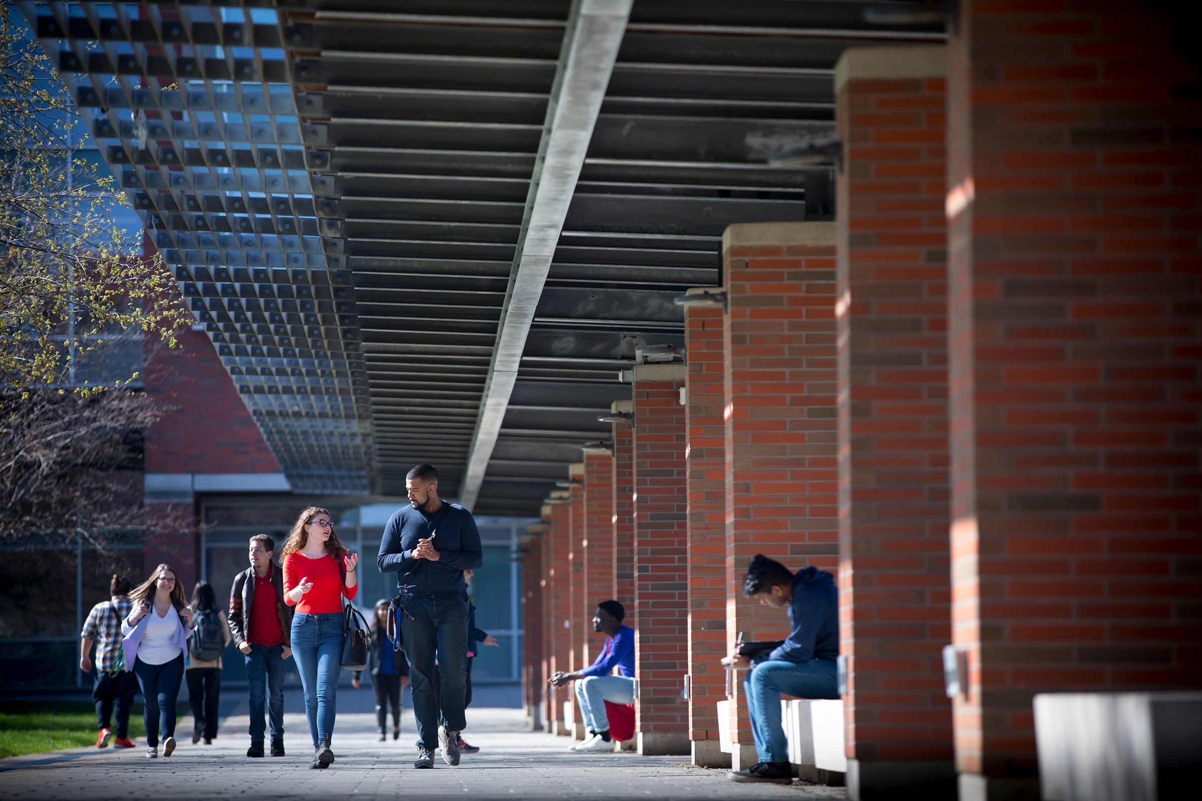 Students walking in Polonsky Commons